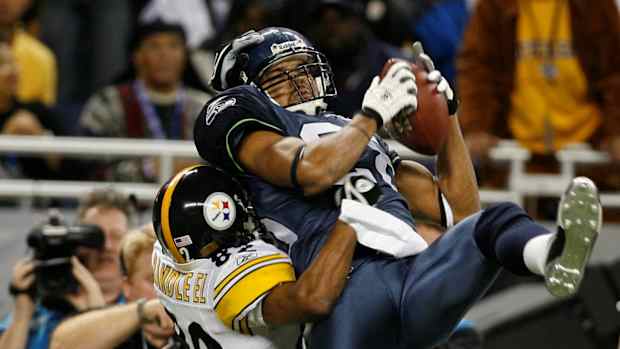 Seattle Seahawks safety Michael Boulware catches a ball in front of Pittsburgh Steelers wide receiver Antwaan Randle El in the third quarter of Super Bowl XL at Ford Field.
